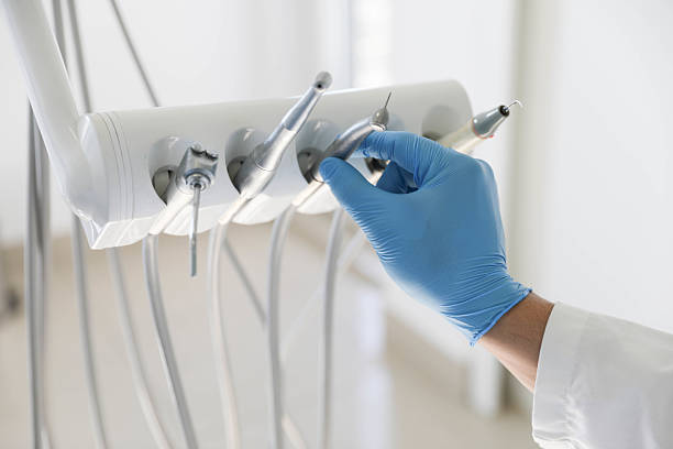 Professional Tooth Extraction technician working in Mount Morris, MI
